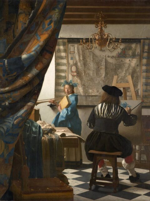 Un peintre à son chevalet travaillant sur un portrait, illustrant le processus de commande de portrait à l’huile peint à la main