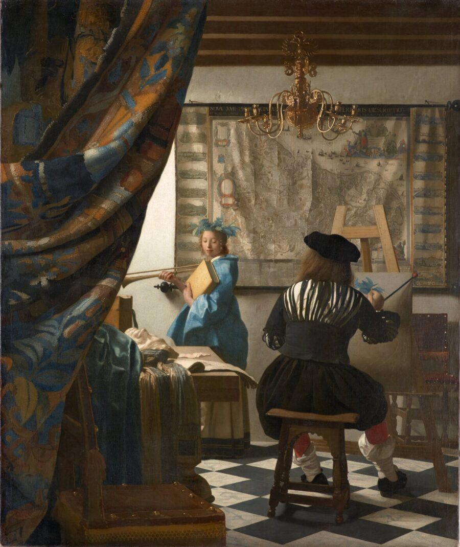 Un peintre à son chevalet travaillant sur un portrait, illustrant le processus de commande de portrait à l’huile peint à la main