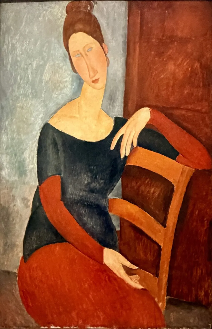 Jeanne seated with the arm resting on the back of the chair (1918) by Amedeo Modigliani — original painting reproduced as a hand-painted oil on canvas