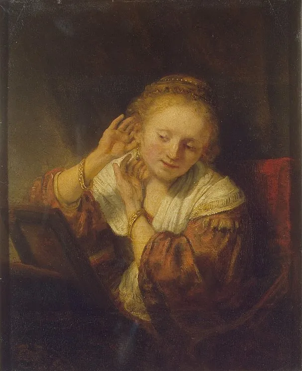 Young woman with earrings — Rembrandt